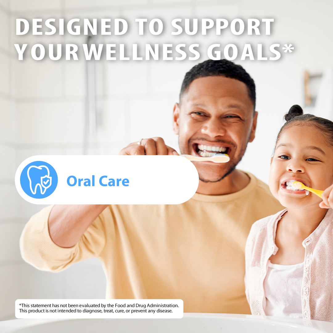 A smiling man and young girl brushing their teeth in a bright bathroom, with large text reading 'DESIGNED TO SUPPORT YOUR WELLNESS GOALS*' and a white badge labeled 'Oral Care' with a tooth icon.